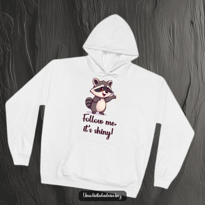 Funny Raccoon Hoodie: Cozy hoodie showcasing an eager raccoon pointing to a magical, shimmering path, perfect for dreamers and funny gifts.