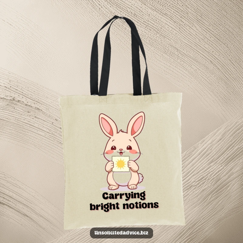 Funny tote bag featuring a happy anthropomorphic rabbit presenting a small, glowing diagram, ideal for carrying inspiration.